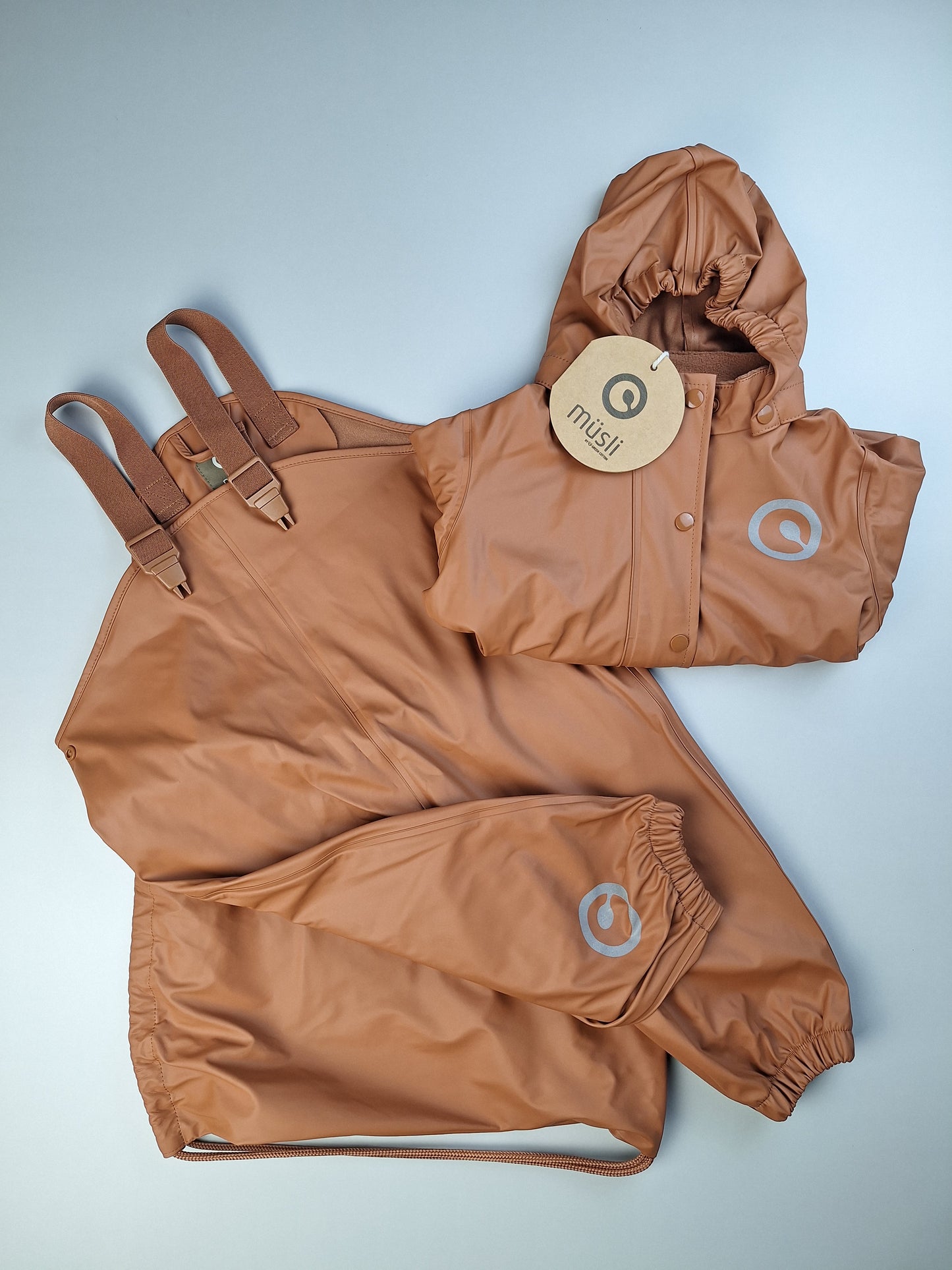 Světle hnědá souprava do deště - kalhoty, bunda, vak