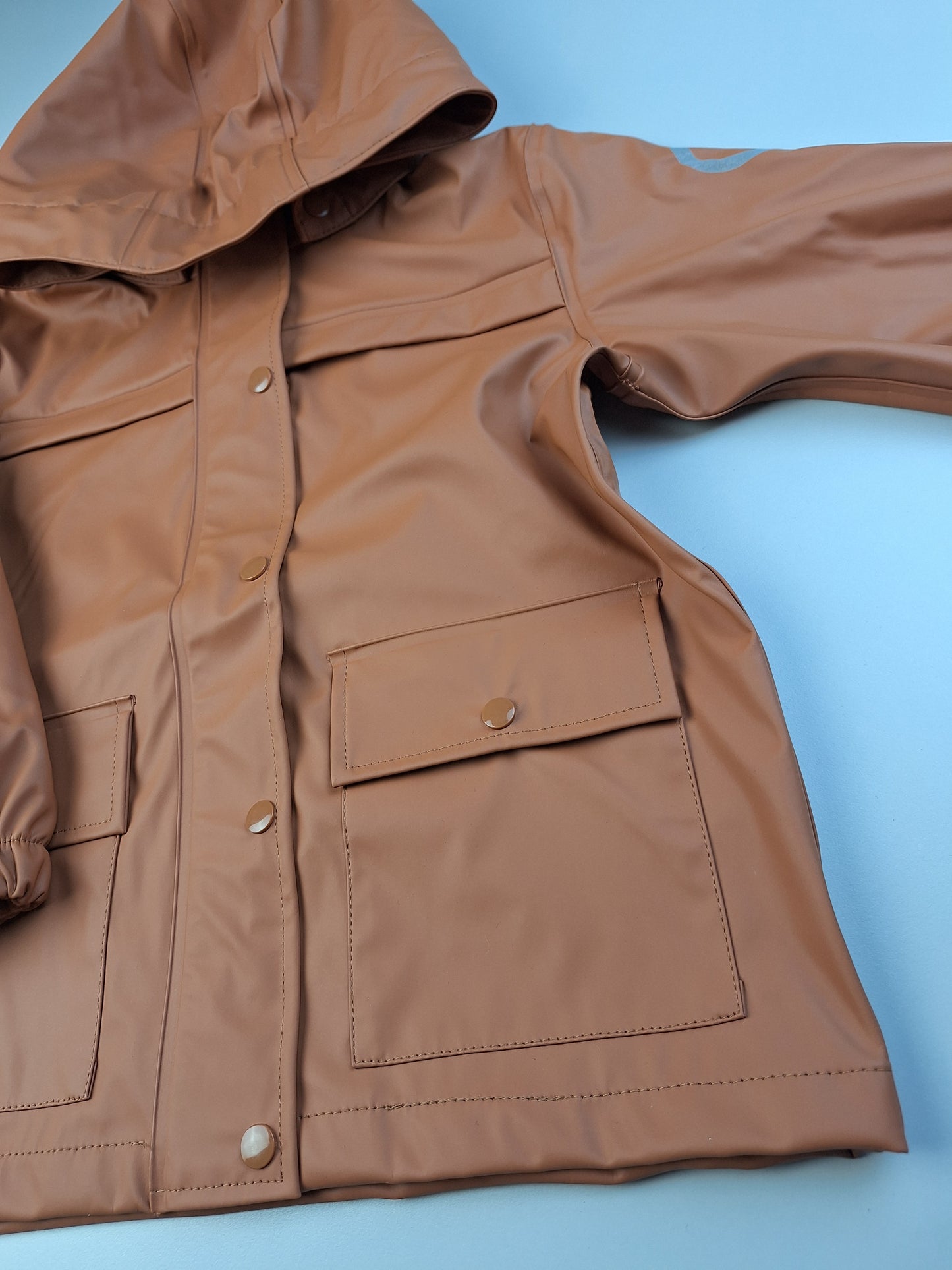 Světle hnědá bunda do deště