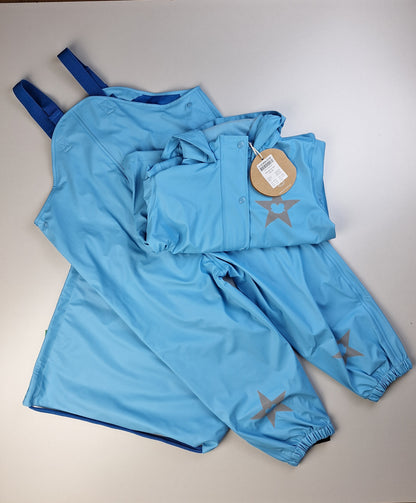 Světle modrá souprava do deště - kalhoty, bunda, vak